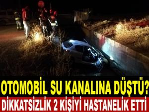 OTOMOBİL SU KANALINA DÜŞTÜ. 2 YARALI